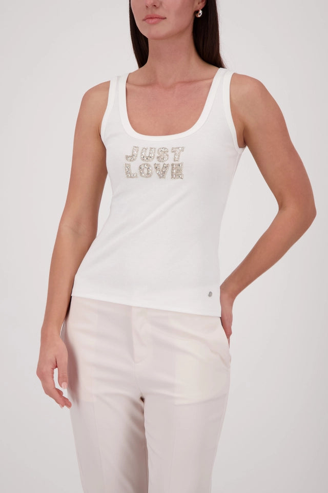 Off White Top With Jewelry
