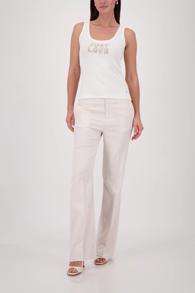 Off White Top With Jewelry