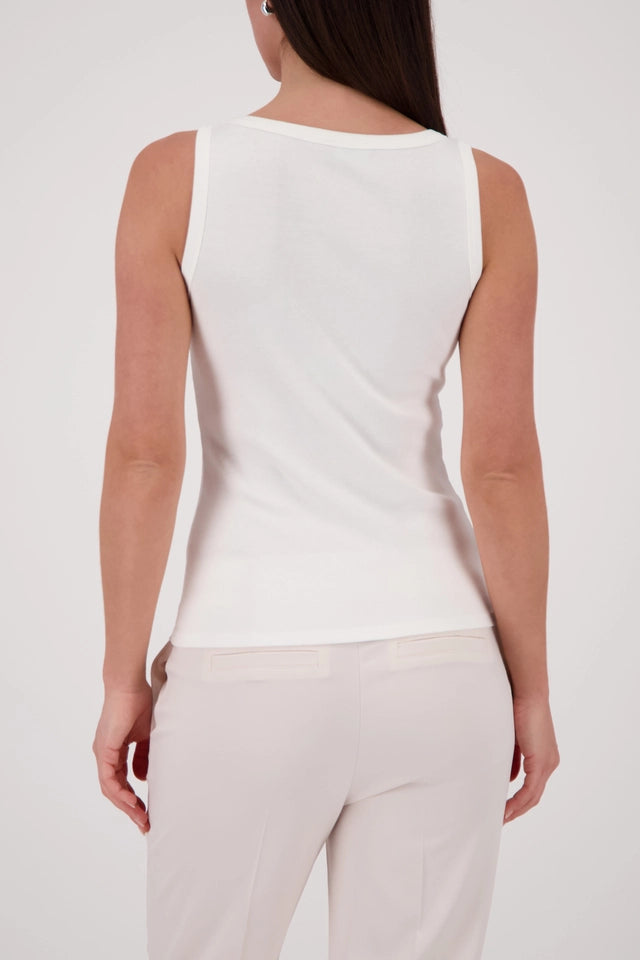 Off White Top With Jewelry