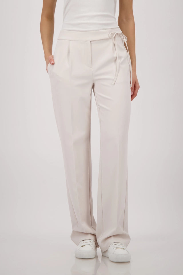 Beige Trousers With A Tie Belt