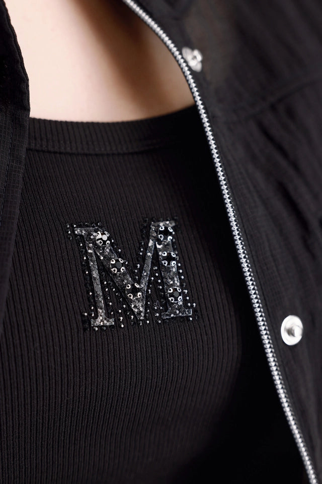 Black Top With Decorative Elements