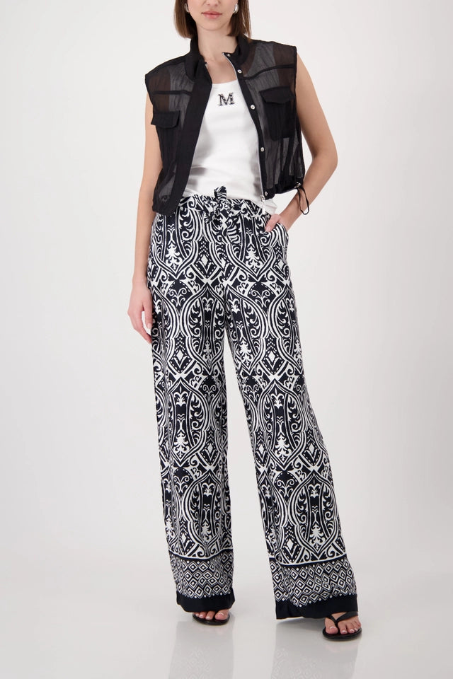 Cream Top With Decorative Elements