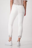 JEANS WITH DECORATIVE HEMS