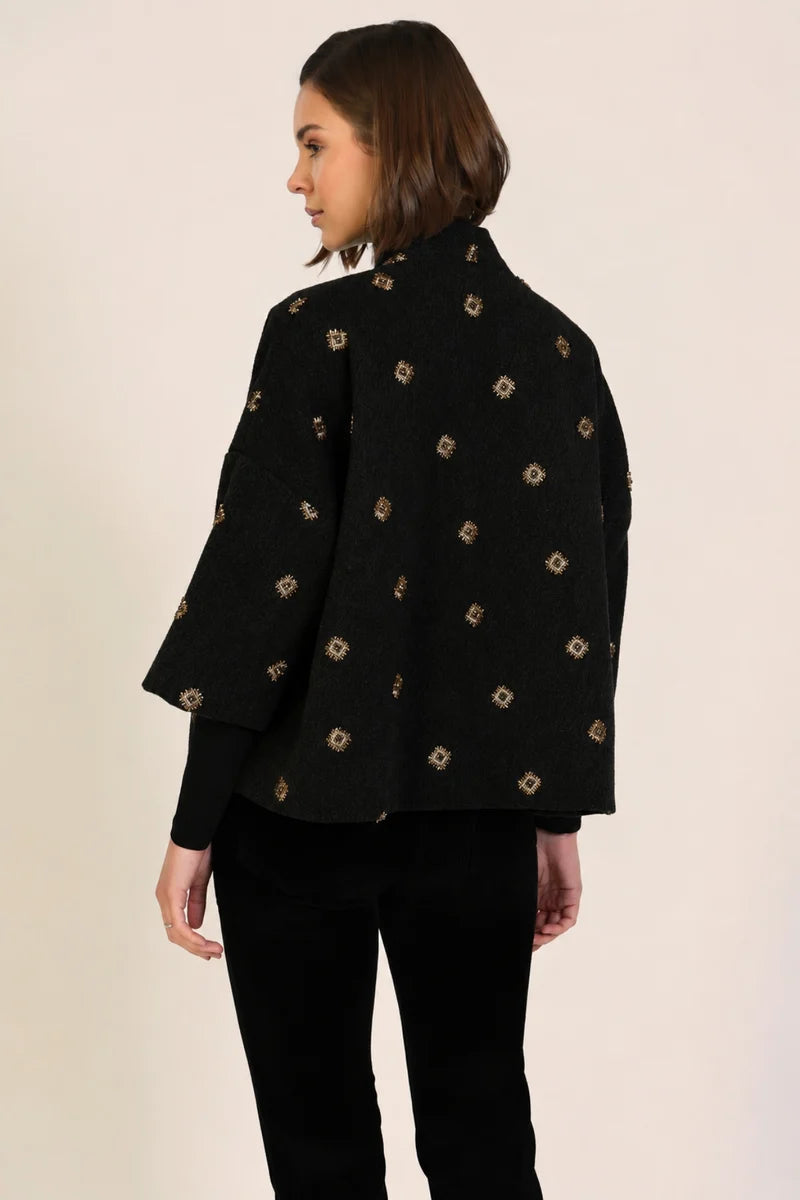 Shrug Jacket in Black With Geometric Stich