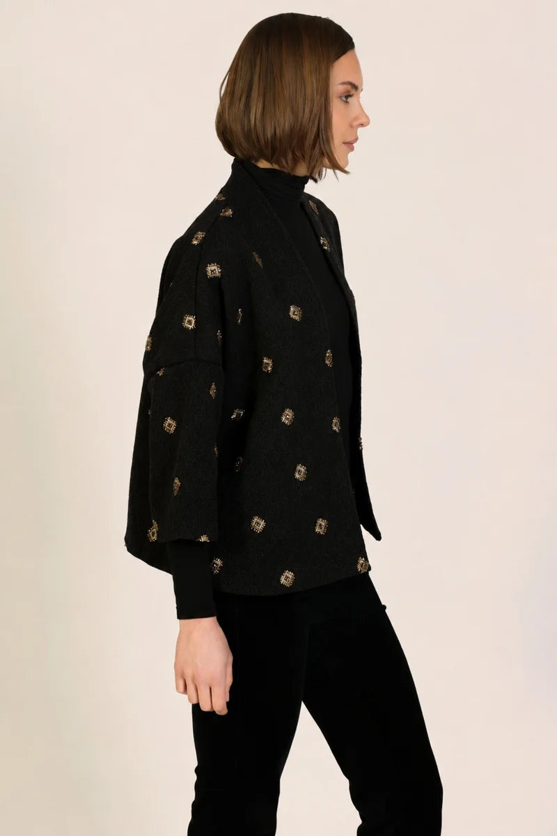 Shrug Jacket in Black With Geometric Stich