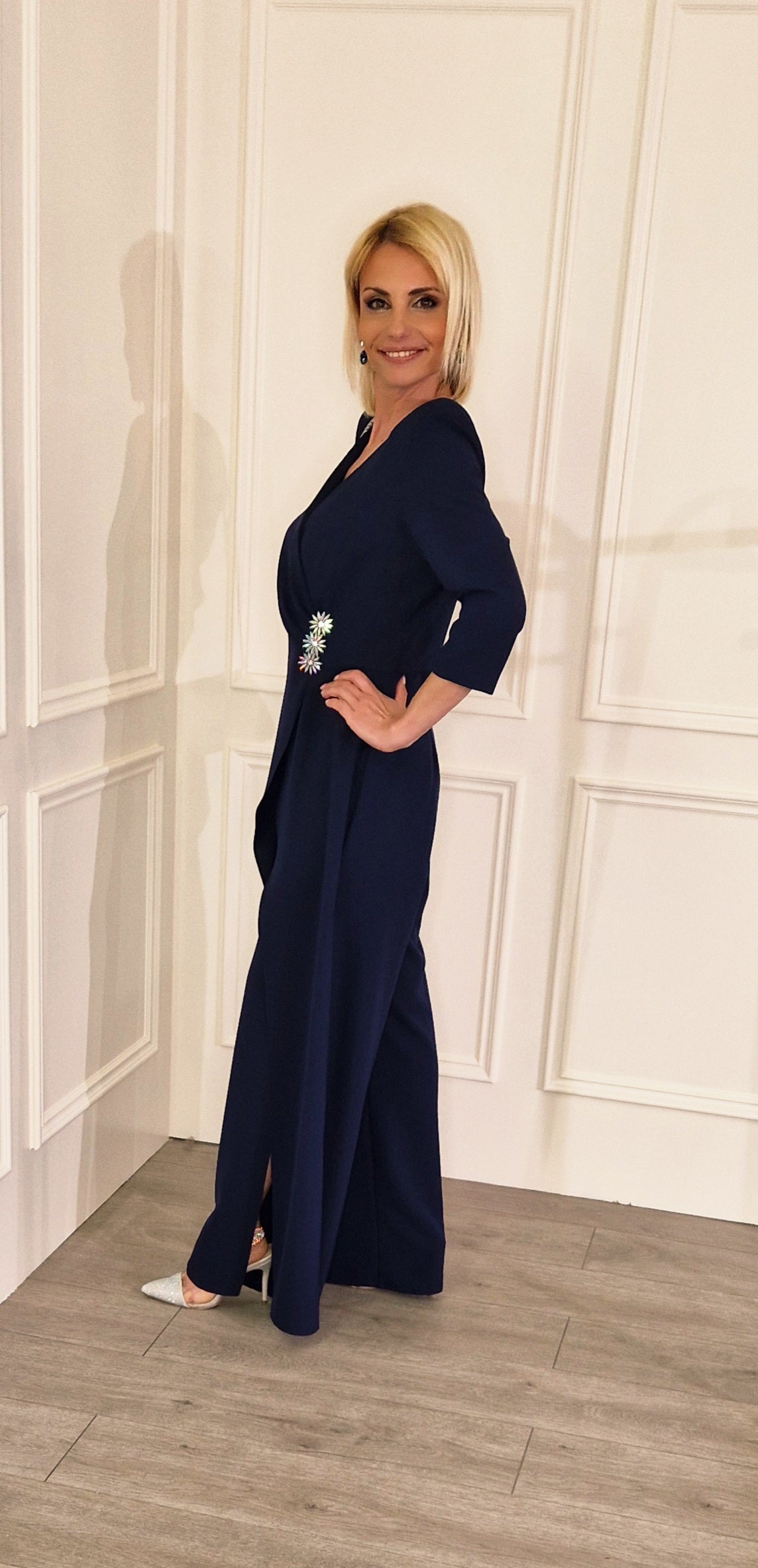 Navy Jumpsuit With Flower Brooch